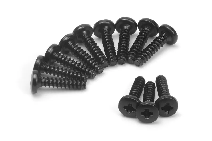 A collection of black pan head screws with coarse threads arranged in a semi-circle and a small group in the foreground.