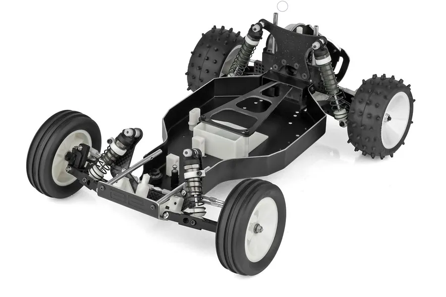 A partially assembled Team Associated RC10 2WD electric buggy chassis kit on a white background.