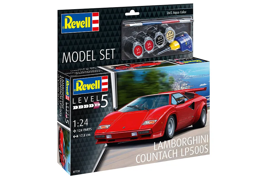 Revell 1/24 scale Lamborghini Countach LP500S plastic model kit box featuring a red car on the packaging with included paints, brush, and glue.