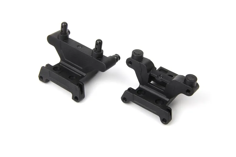 Two black plastic RC shock towers for BlackZon vehicles, shown from a high angle against a white background.