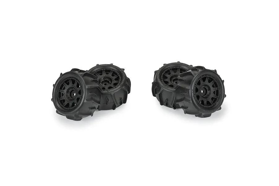 Four Pro-Line 1.9 inch Dumont paddle tyres mounted on black Raid wheels, shown from an angled perspective against a white background.