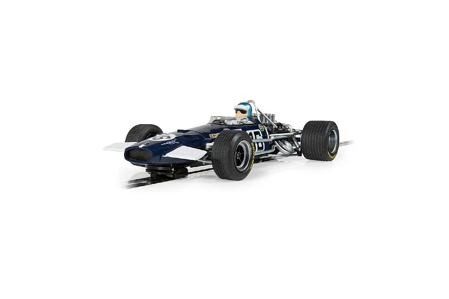 A 1/32 scale Scalextric 1969 Brabham BT26 slot car in dark blue with white racing number 16, shown on a track.