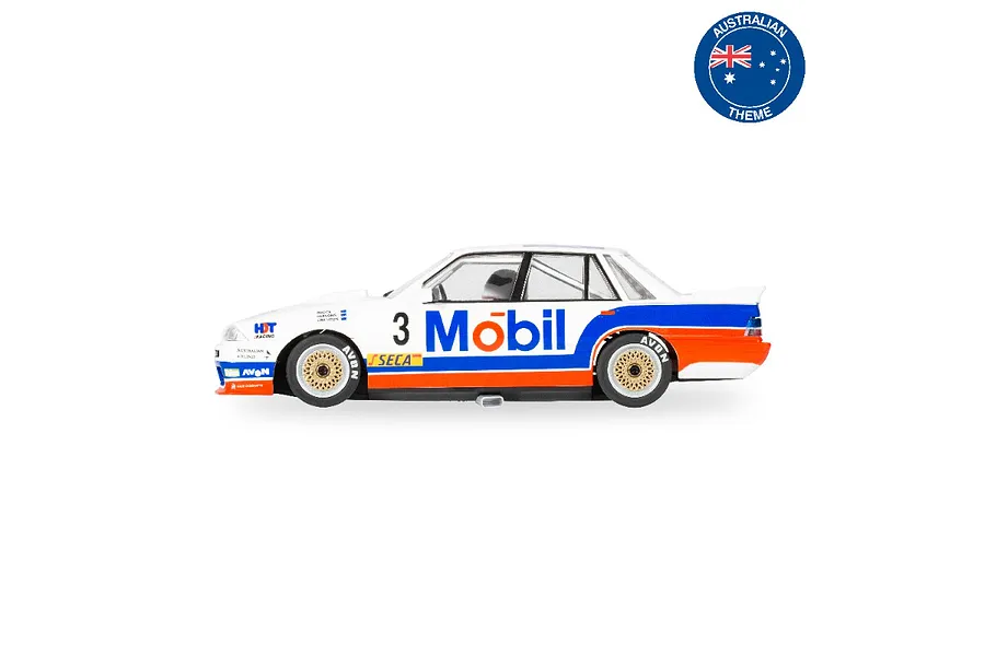 Side view of a Scalextric 1/32 scale Holden VL Commodore slot car in white, blue, and orange Mobil livery with number 3.