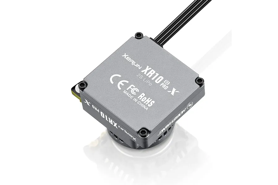 Hobbywing Xerun XR10 Pro G3X brushless ESC in a grey metal casing with black wiring, viewed from an elevated angle against a white background.