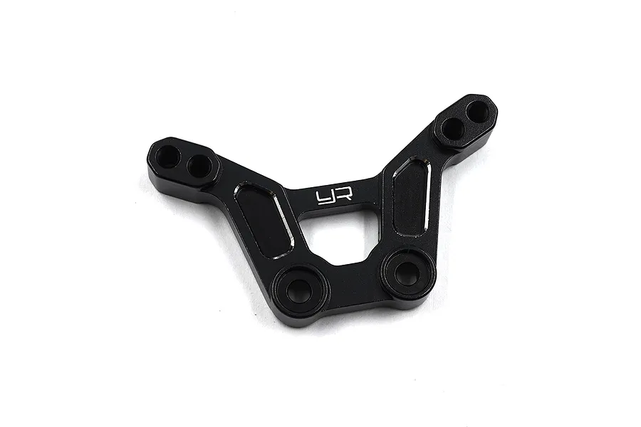A black anodized aluminium front shock tower for an RC car with the Yeah Racing logo engraved in the center.