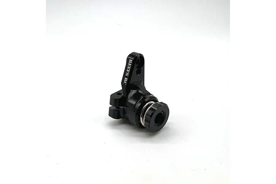 A black Reefs RC aluminium 25T servo saver shown from a side angle against a white background.
