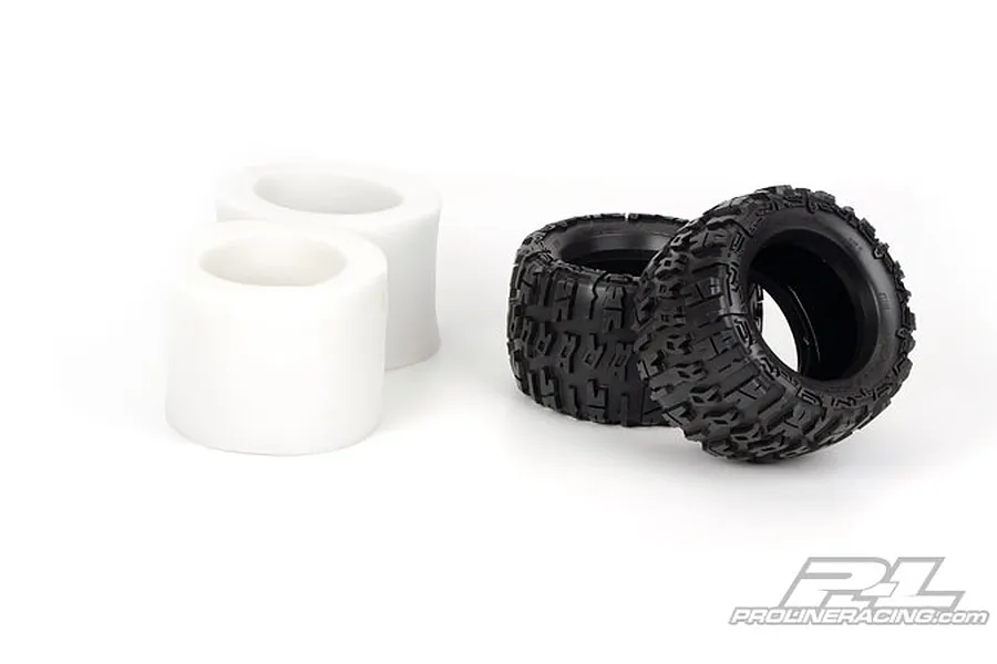 Two black Pro-Line Trencher RC monster truck tyres and two white foam inserts on a white background.