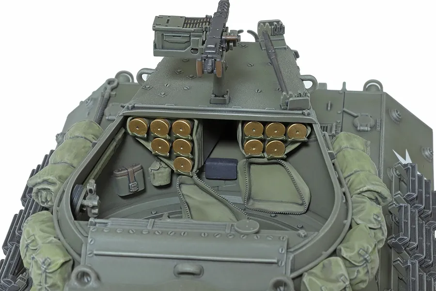 Top-down view of a Tamiya 1/35 scale M36 tank destroyer model showing the open turret interior with ammunition racks and a mounted machine gun.