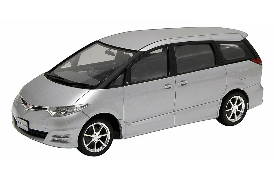 A 1/24 scale silver Toyota Estima model car, showing a detailed exterior with black window trim and alloy wheels against a white background.