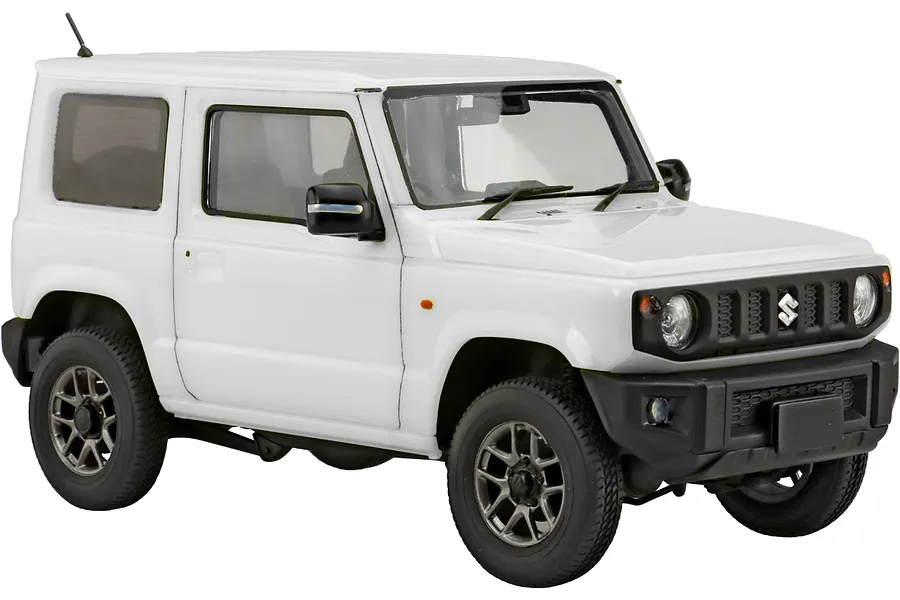 A white 1/24 scale model of a Suzuki Jimny JB64 SUV, showing the front three-quarter view against a white background.