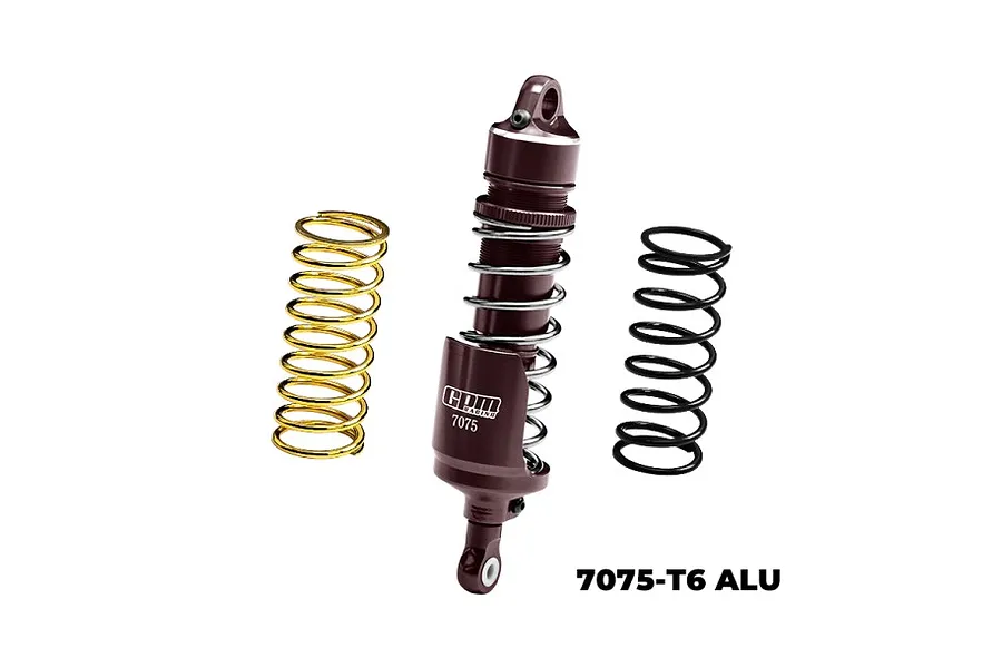 GPM Racing titanium-coloured aluminium rear shock absorber with two additional springs, one gold and one black, on a white background.