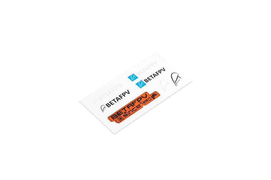 A BetaFPV sticker sheet featuring various brand logos and a large orange graphic on a white backing sheet.