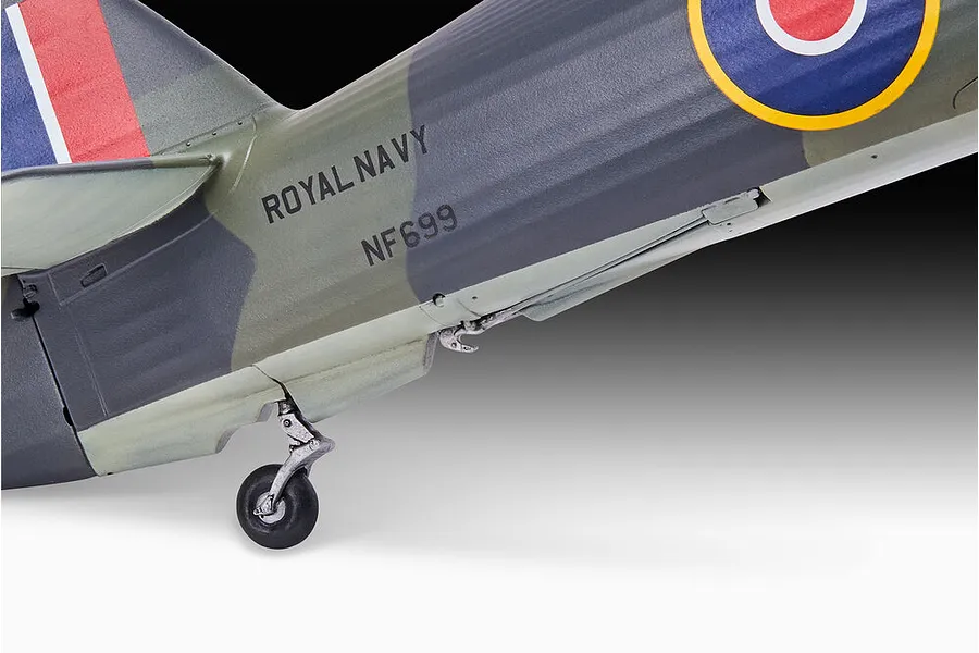 Close-up of the rear fuselage of a 1/32 scale Hawker Sea Hurricane model, showing Royal Navy markings, tail fin, and tail wheel assembly.