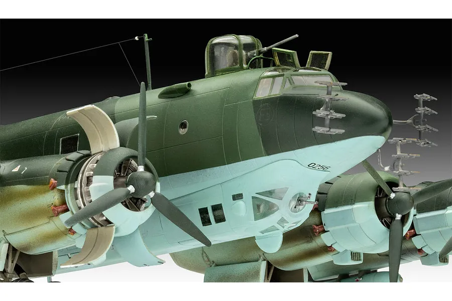 Close-up of a finished 1/72 scale plastic model of a Focke-Wulf Fw 200 Condor bomber, showing the nose, cockpit, and engine nacelles.