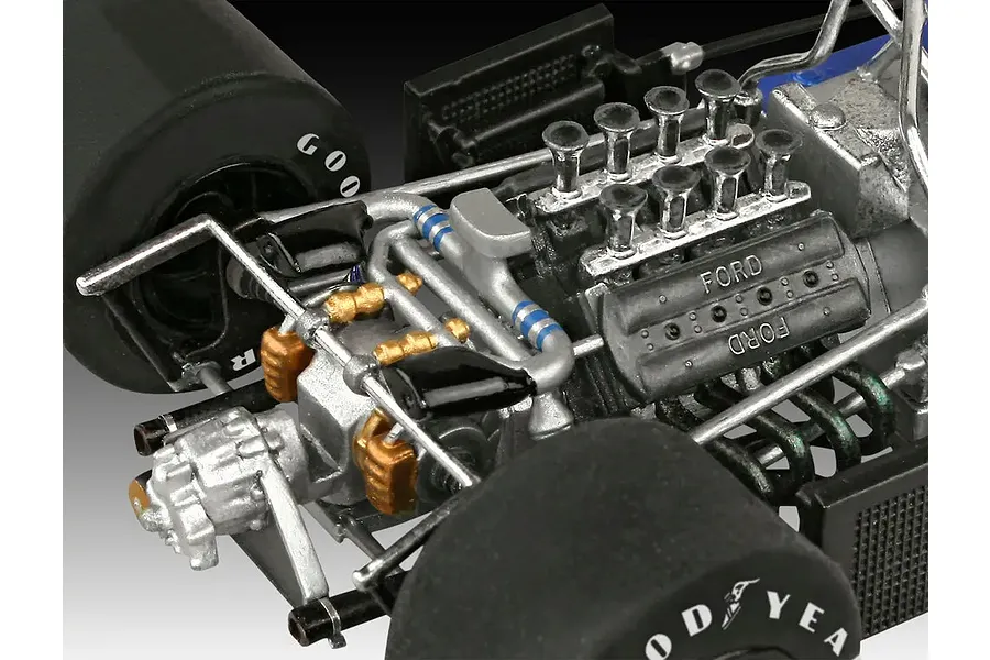 Close-up of a detailed scale model Ford engine and rear suspension assembly for a Tyrrell P34 Formula 1 car.