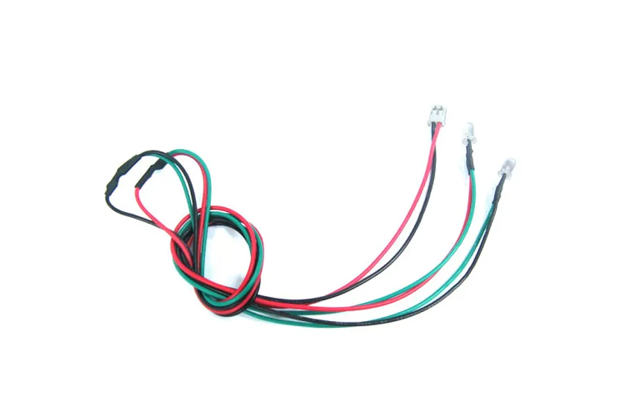 A Yeah Racing 3mm LED light set with two clear LED bulbs connected by red, black, and green wires, featuring a small white connector plug.