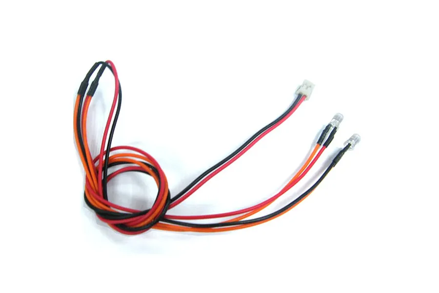 A pair of 3mm orange LED lights with black and orange wiring and a small white connector, coiled on a white background.