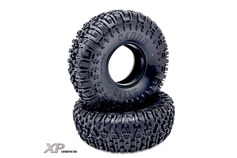 Two black Reefs RC 1.9 inch Sabre crawler tyres stacked on a white background, featuring aggressive tread patterns and embossed sidewall branding.