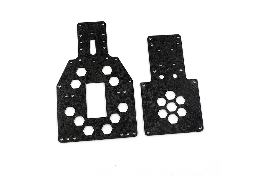 Two forged carbon fiber chassis plates with hexagonal cutouts on a white background.