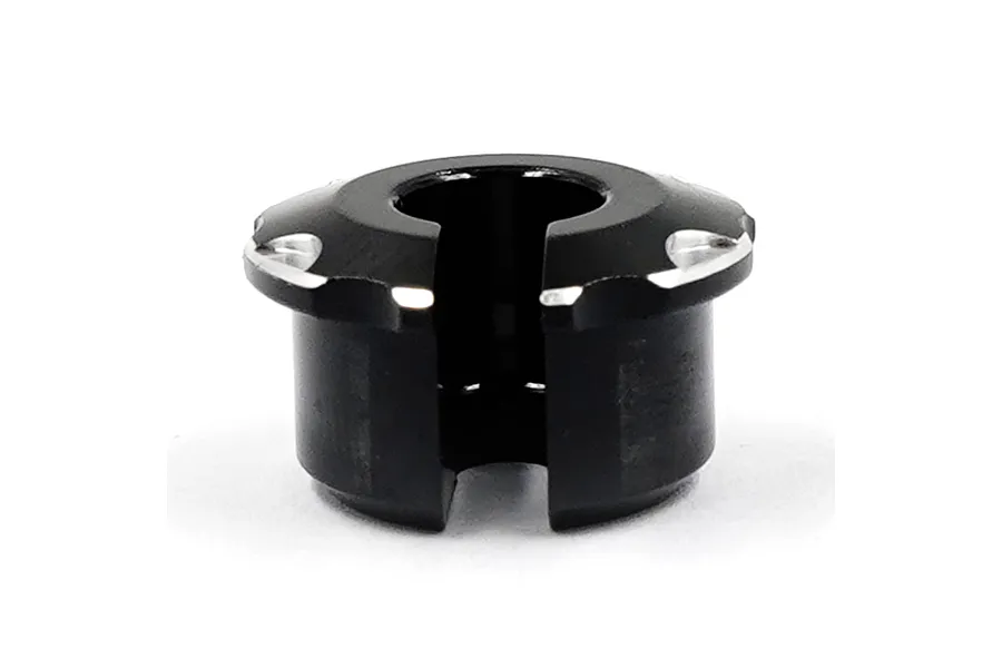 A black anodized aluminium RC shock spring retainer with a split design, featuring silver chamfered edges.