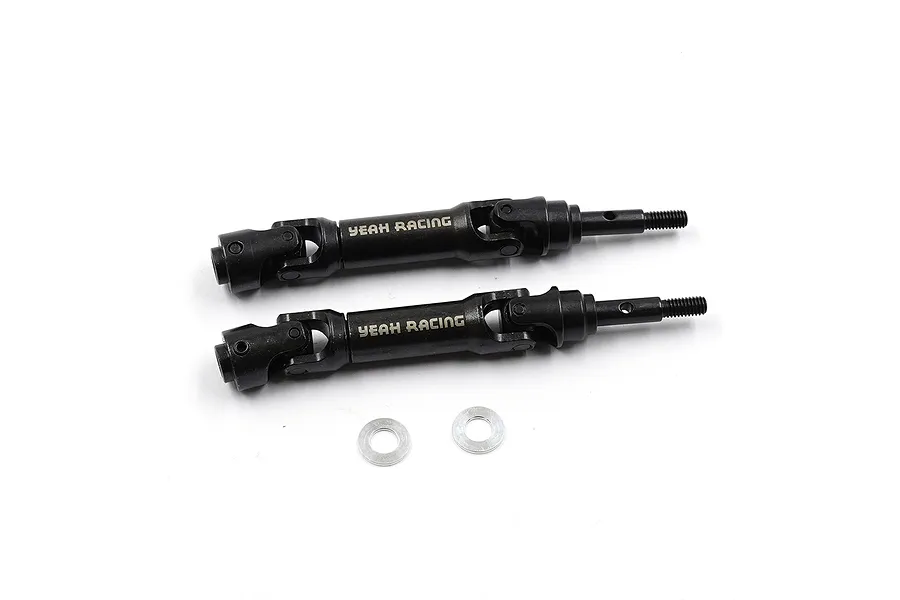 Two black Yeah Racing steel CVD driveshafts with two silver metal washers on a white background.