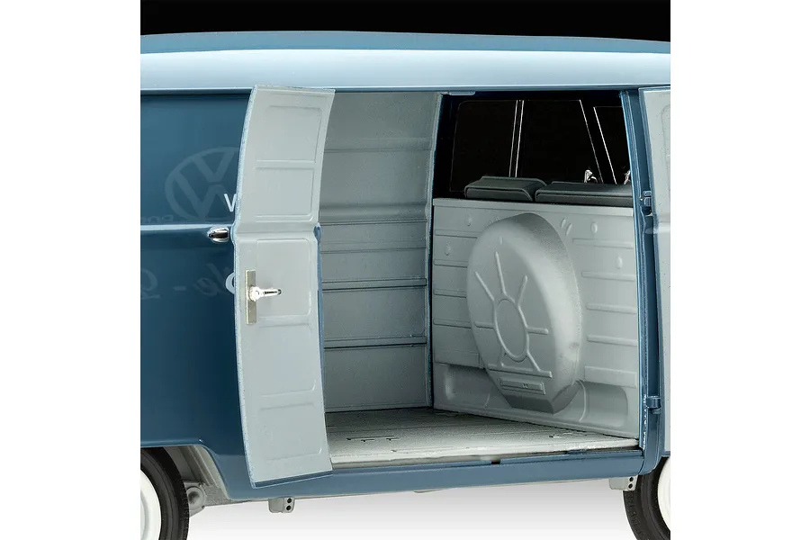 Close-up of the open side cargo door of a blue Revell 1/16 scale VW T1 Panel Van model, showing the grey interior and wheel arch detail.