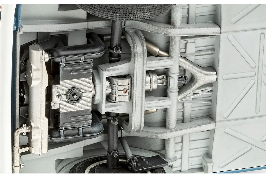 Close-up view of the detailed undercarriage and engine assembly of a 1/16 scale VW T1 model van.