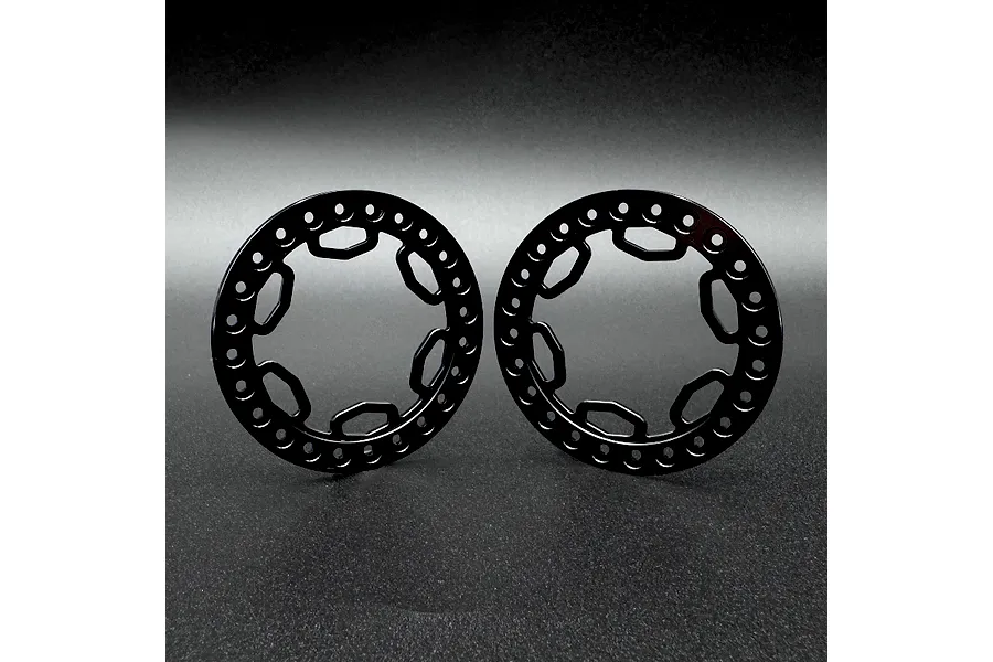 Two black aluminium beadlock rings for 1.9 inch RC wheels, featuring a circular design with multiple bolt holes and inner cutouts.