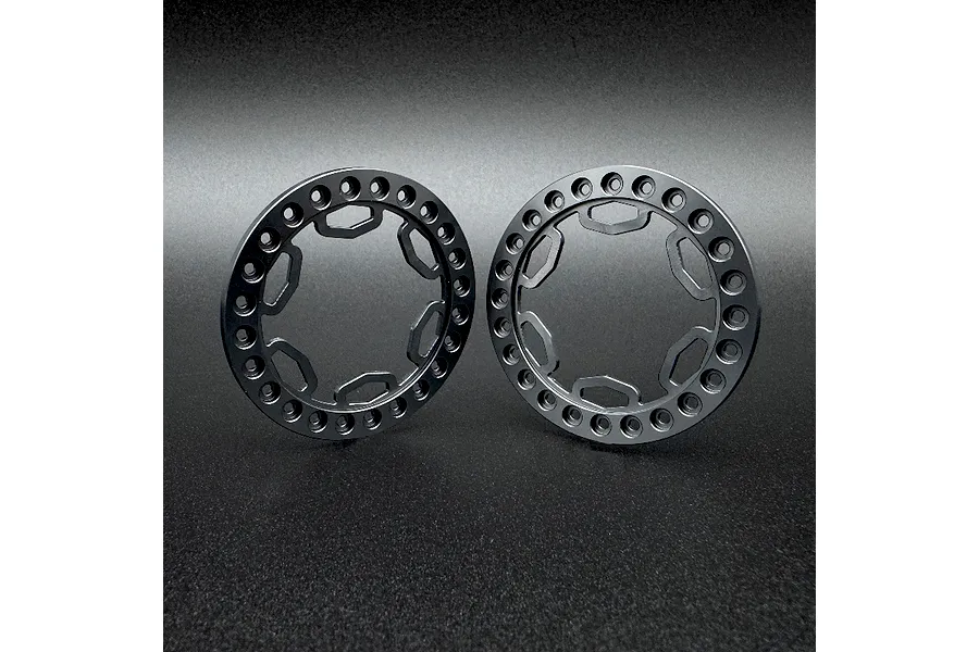 Two grey aluminium beadlock rings for 1.9 inch RC wheels, featuring a circular design with multiple bolt holes and a geometric inner cutout pattern.