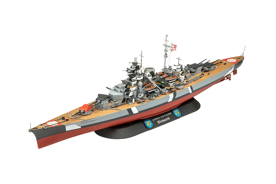A fully assembled and painted plastic model of the German battleship Bismarck on a black display stand against a white background.