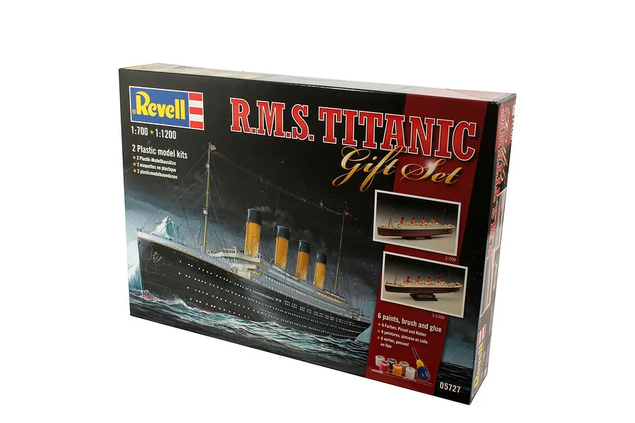 Revell R.M.S. Titanic Gift Set plastic model kit box showing 1/700 and 1/1200 scale ships, paints, brush, and glue.