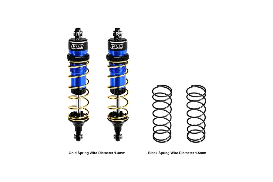 Two GPM Racing blue and black adjustable RC shock absorbers with gold springs installed, plus two spare black springs on a white background.