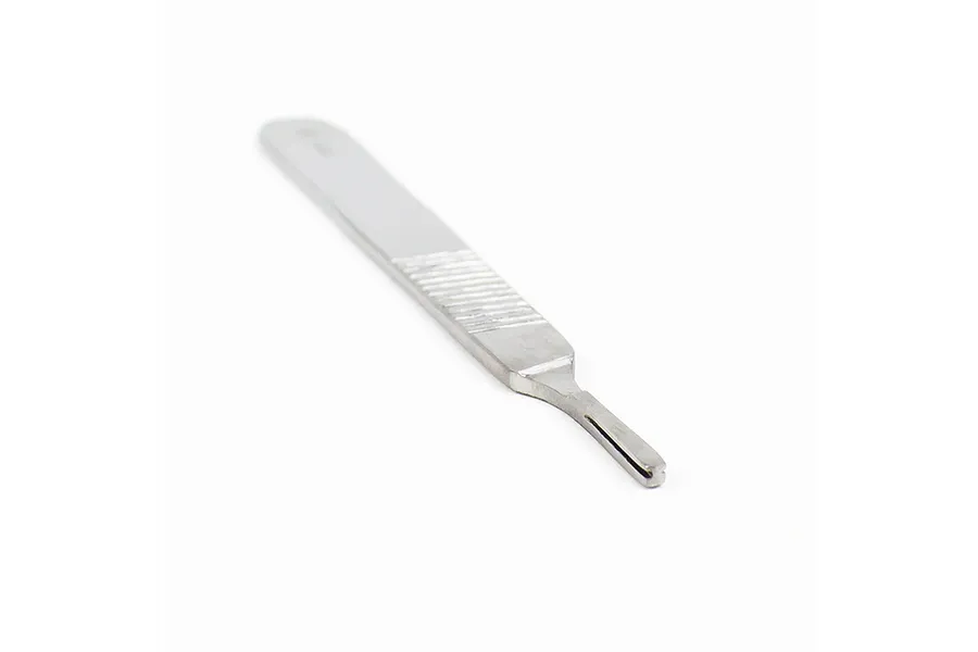 A stainless steel #3 scalpel handle shown at an angle against a white background.