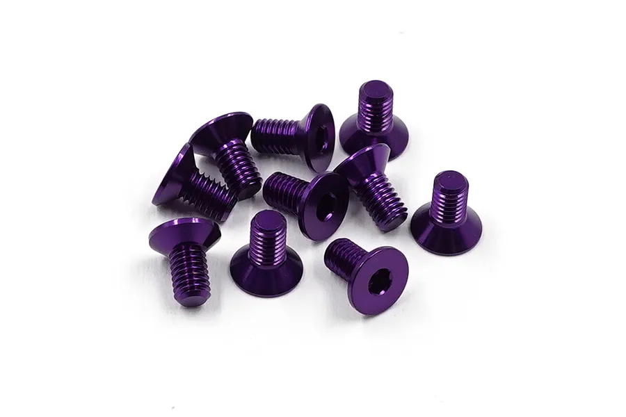 A collection of ten purple anodized aluminium countersunk head screws with hex drive sockets, arranged on a white background.