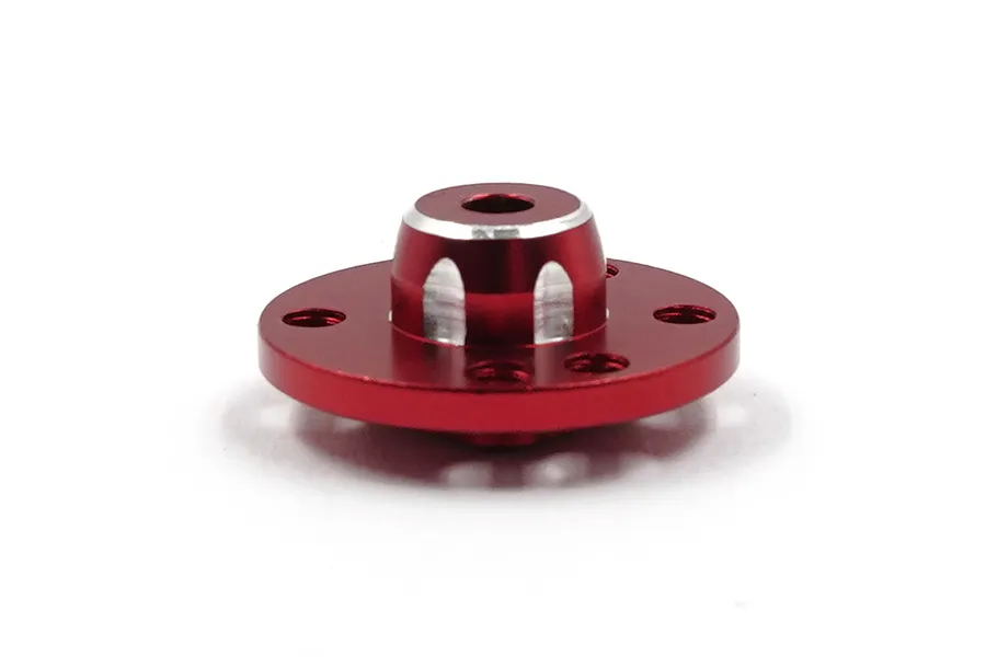 A red anodized aluminium spur gear mount for RC cars, featuring a circular base with mounting holes and a central hub with silver machined accents.
