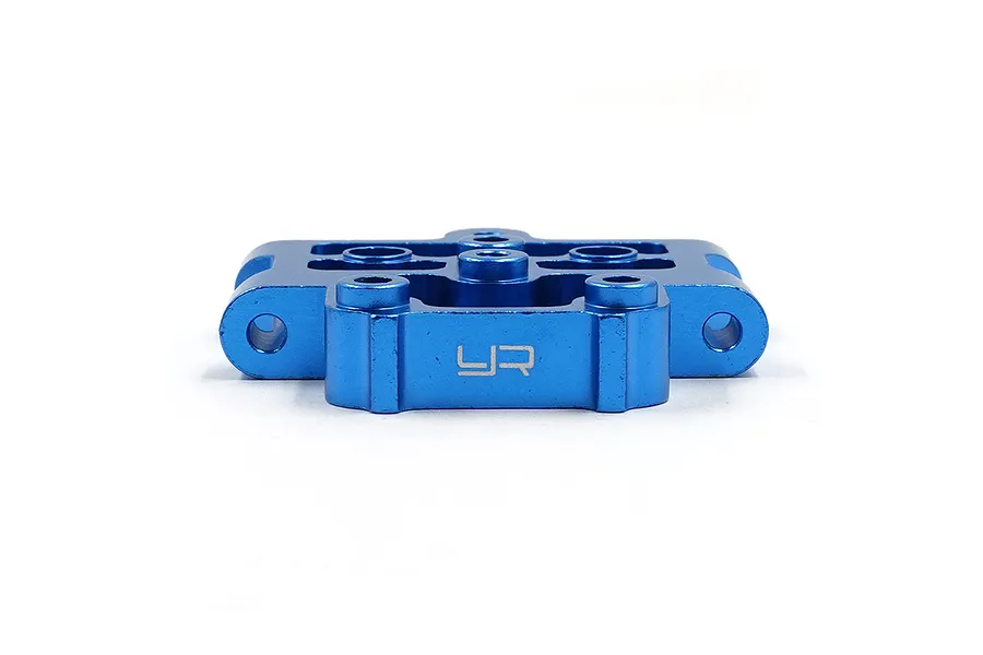 A blue anodized aluminium front lower suspension mount for an RC car, featuring the Yeah Racing logo engraved on the front face.