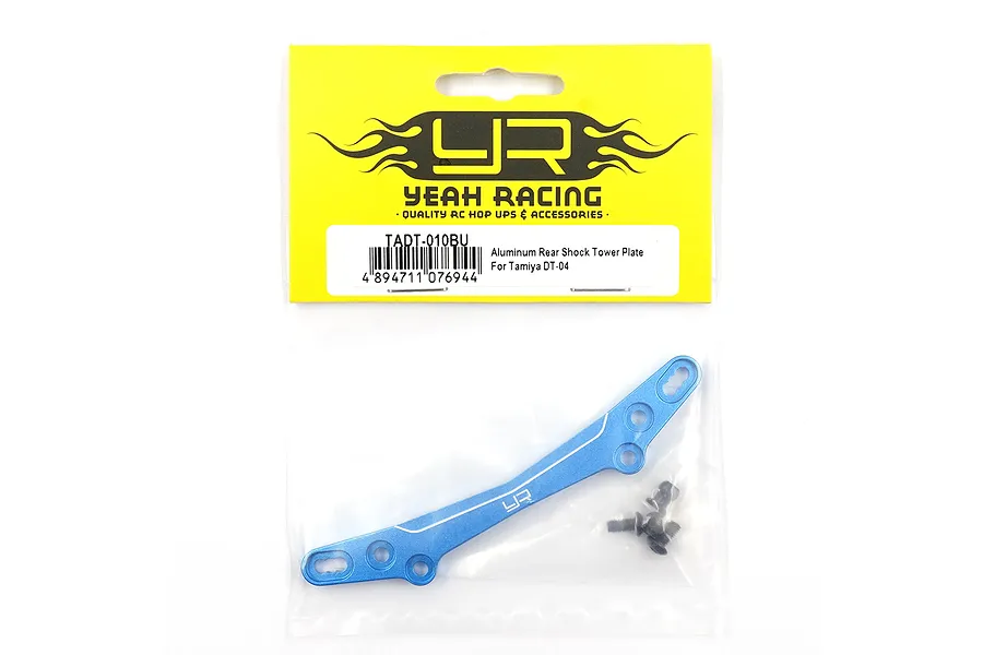 A blue aluminium rear shock tower plate for Tamiya DT-04 by Yeah Racing, packaged in a clear plastic bag with a yellow header card.