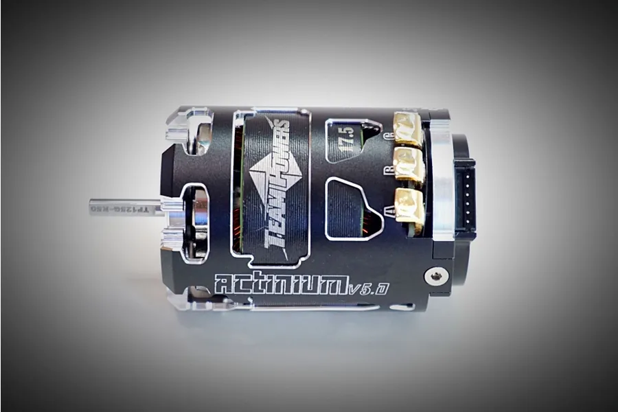 Team Powers Actinium V5 17.5T sensored brushless motor in black with silver accents, featuring visible terminal tabs and branding.