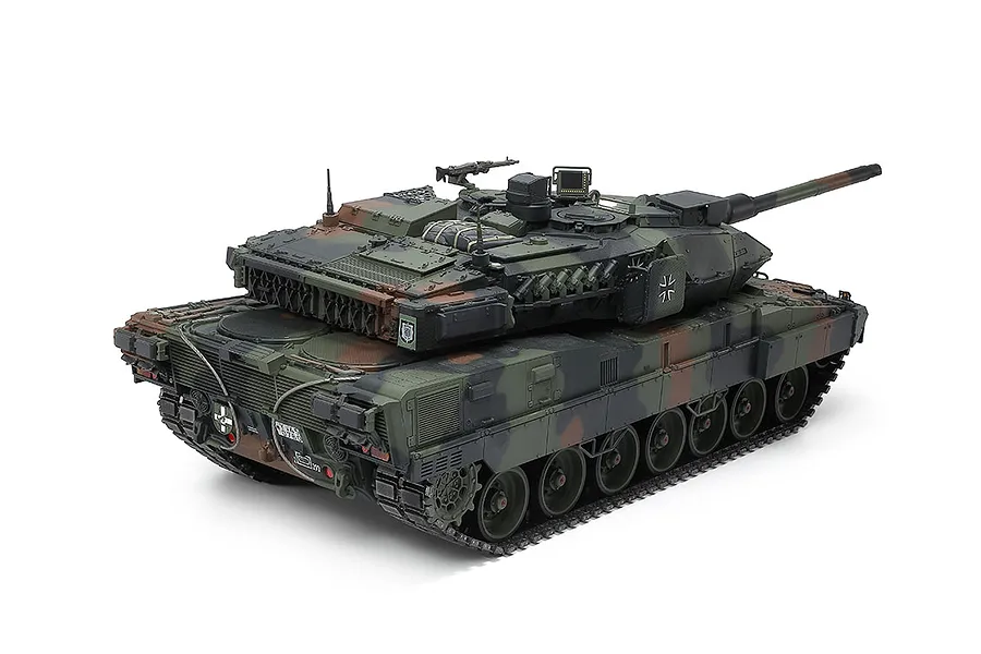 A high-detail 1/16 scale Tamiya Leopard 2 A7V RC model tank featuring a realistic three-tone camouflage paint scheme on a white background.