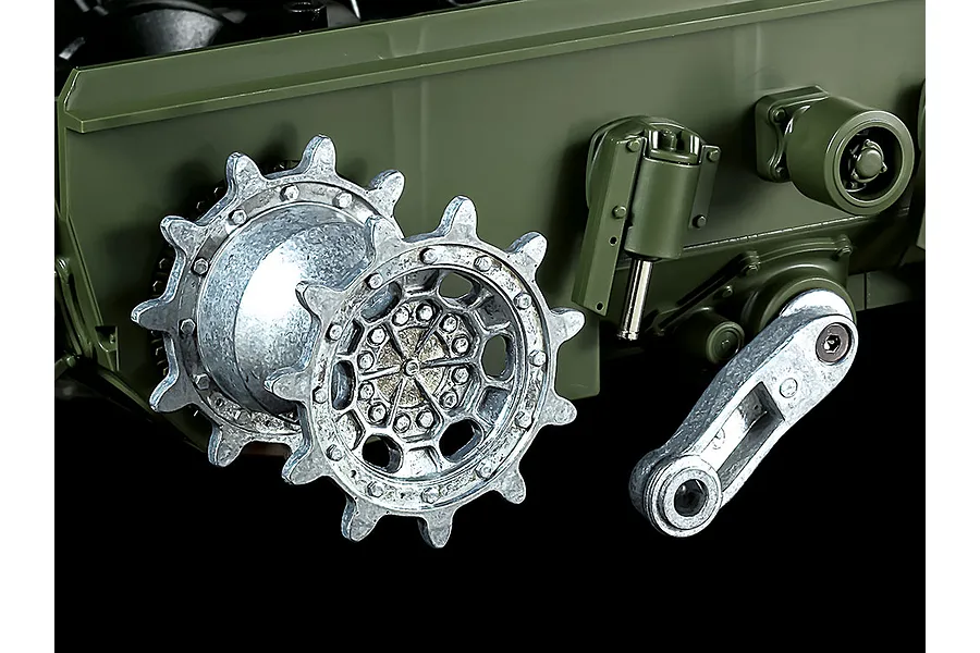 Close-up of the drive sprocket and suspension arm on a Tamiya 1/16 scale Leopard 2 A7V RC tank model.