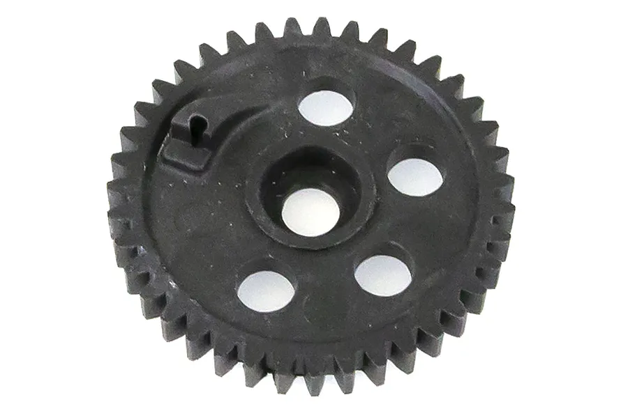 A black plastic spur gear for an RC car, featuring a central hole and several smaller circular cutouts.