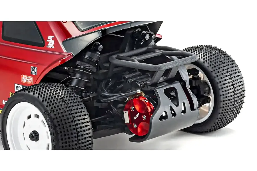 Close-up rear view of the Kyosho Ultima SB Dune Master RC buggy showing the red motor, rear tires, and roll cage.