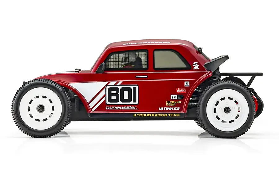 Side profile view of the Kyosho Ultima SB Dune Master RC buggy in red with white wheels and racing decals.