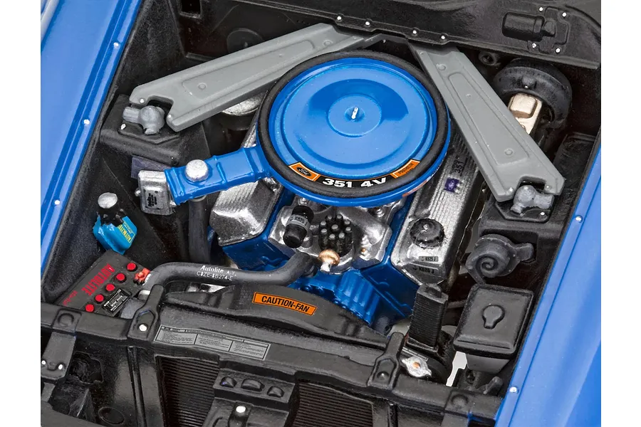 A detailed scale model engine bay of a 1971 Ford Mustang Boss 351, featuring a blue air cleaner and engine block.