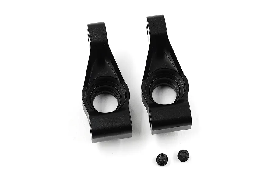Two black aluminium RC rear hubs and two small black grub screws on a white background.