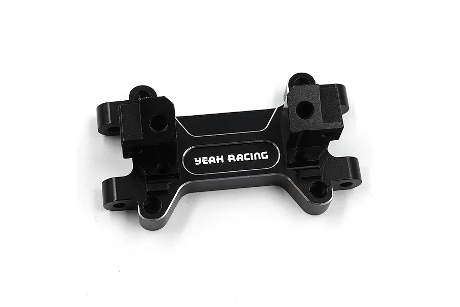 A black anodized aluminium front bulkhead for an RC car by Yeah Racing, featuring machined edges and the brand logo.