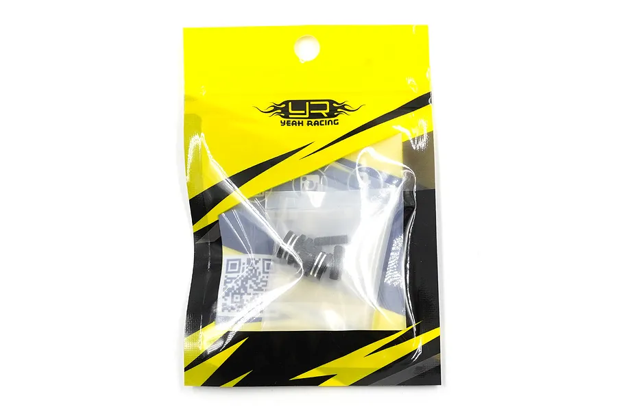 Two black aluminium twist nuts in a yellow and black Yeah Racing branded plastic retail bag.