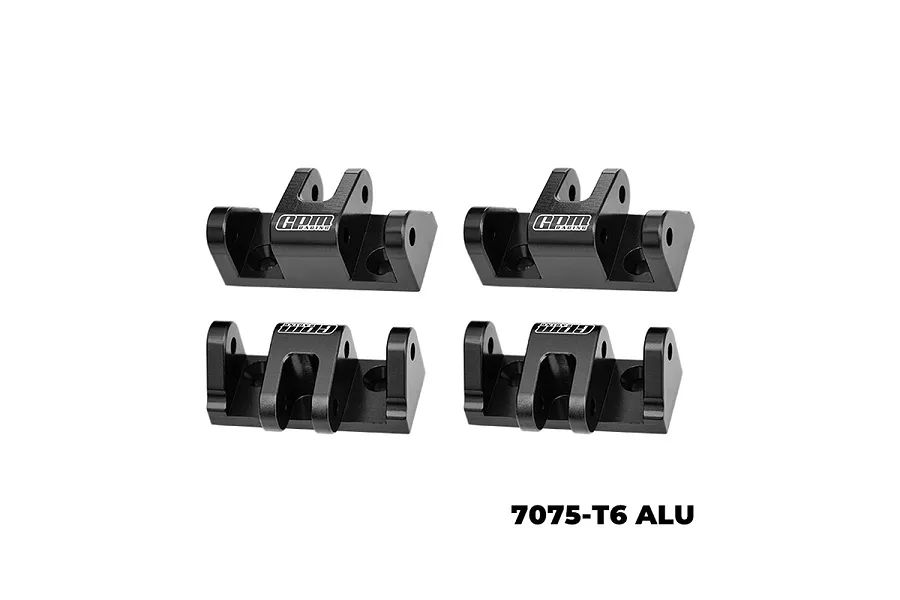 Four black GPM Racing aluminium lower shock mounts arranged in a grid against a white background.