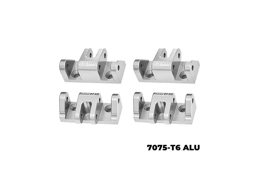 Four silver GPM Racing aluminium lower shock mounts arranged in a grid against a white background.