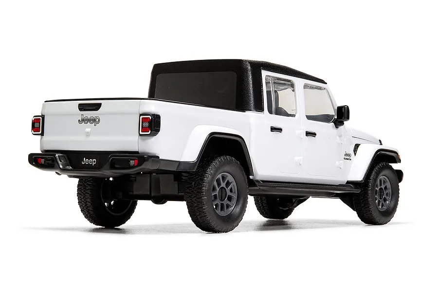 A white Jeep Gladiator model truck shown from a rear three-quarter angle against a white background.